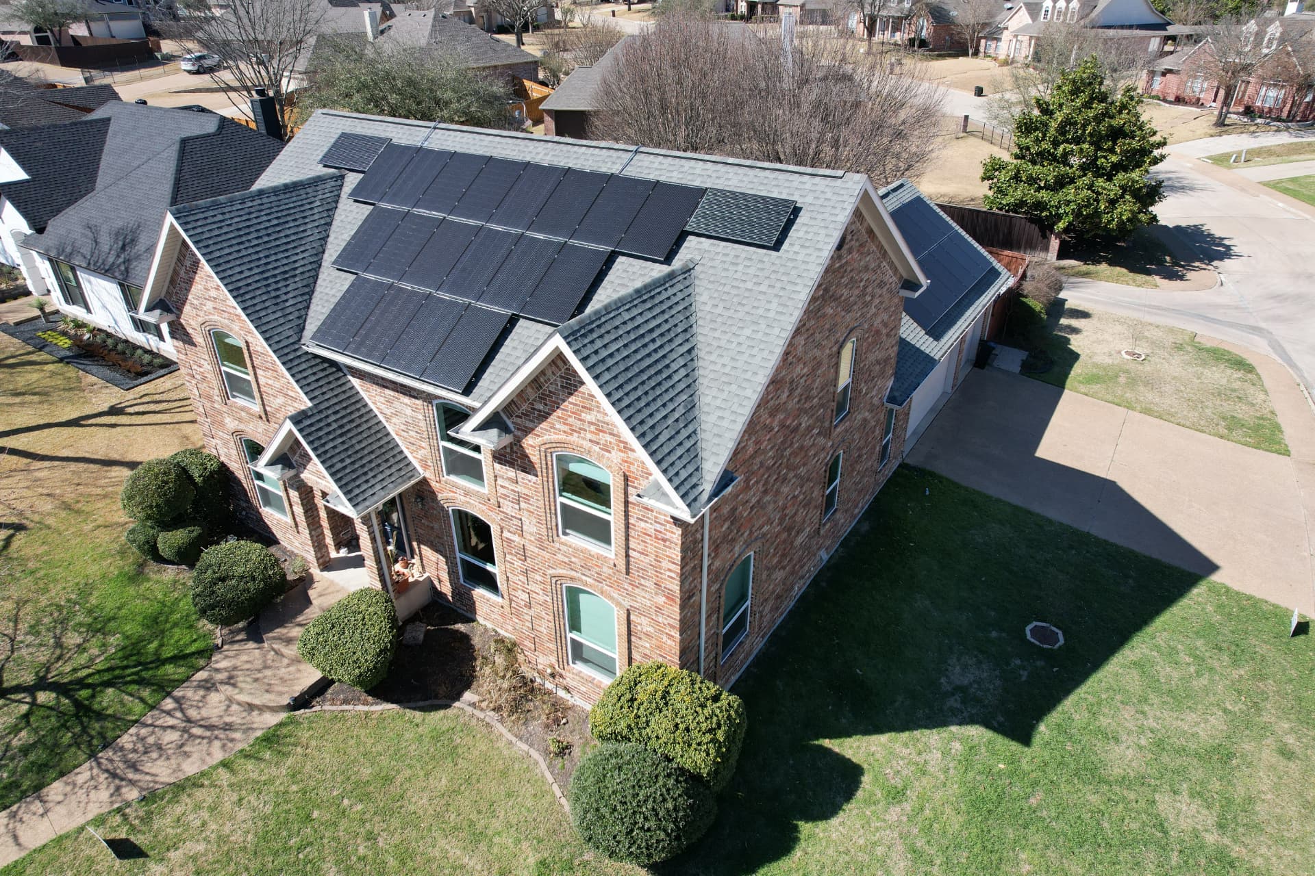 Solar panel array installed on a residential shingle roof
